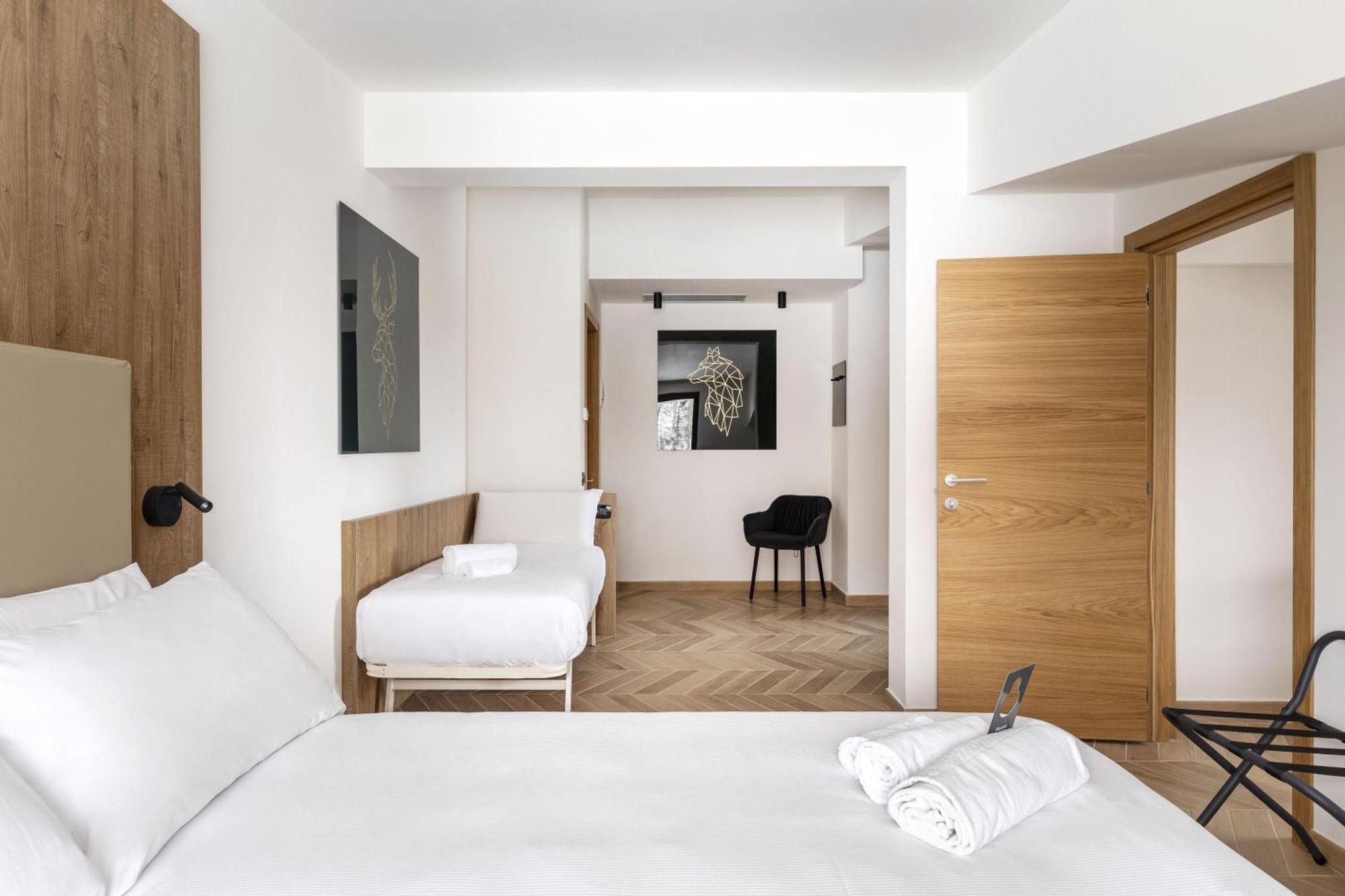 Dreibettzimmer mit Bergblick